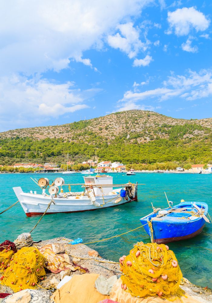 Things to Do in Samos Greece, Pythagorion Bay with fishing boats and nets