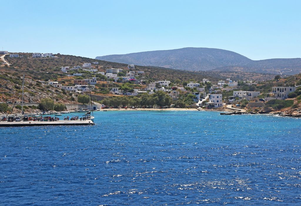 The port of Iraklia Greece and people waiting at the dock 