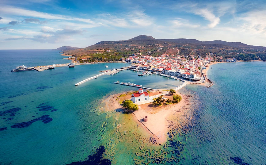 Drone view of Elafonisos port with a church 