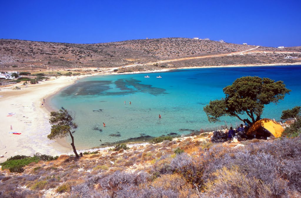 Livadi beach with swimmers in Iraklia Greece
