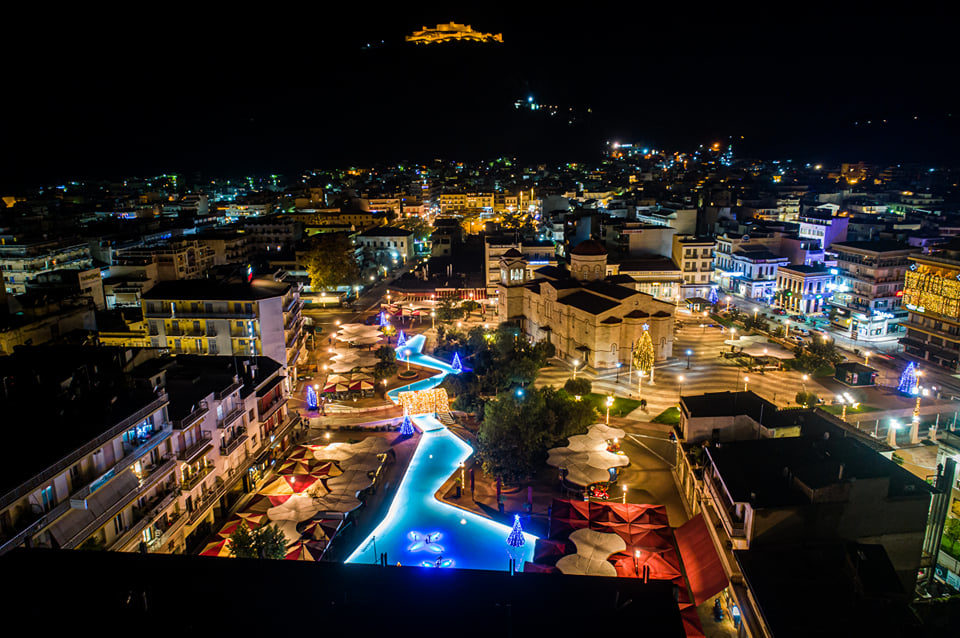 The central square in Argos Greece lit during the night.