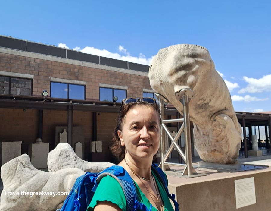 Evgenia at the courtyard of the archaeological museum in Thebes Greece.