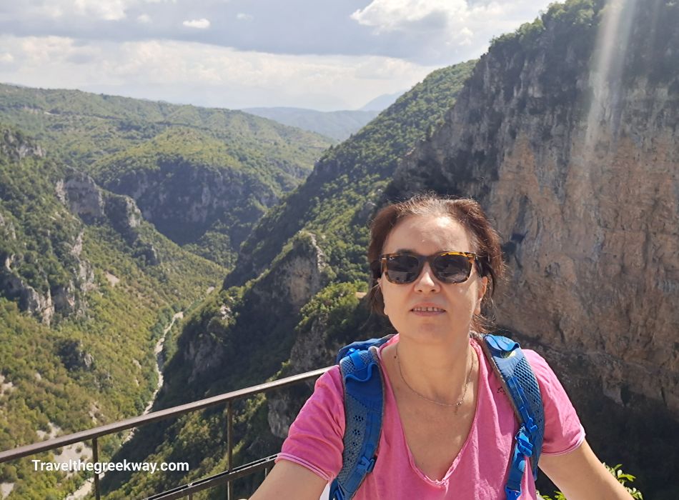 Evgenia at the Monastery of Agia Paraskevi viewpoint in Monodendri Greece. 