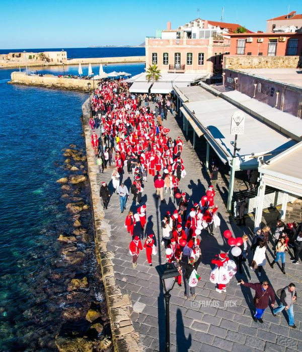 Crete in winter. Santa Claus run in Chania with many people dressed as Santa Claus. 