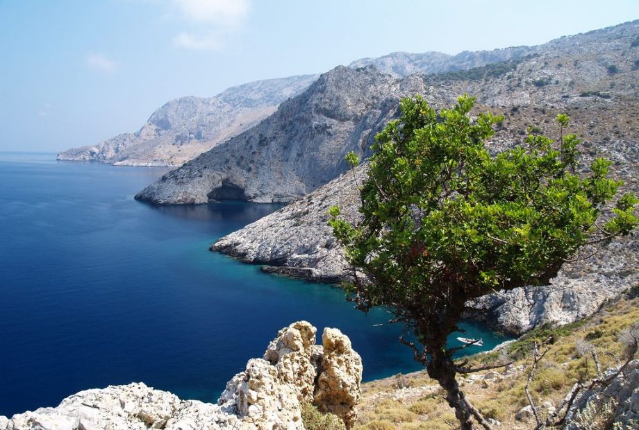 Gioura is a deserted island off the coast of Alonissos, characterized by its rocky terrain.