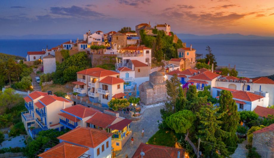 A charming glimpse of the quaint hillside village of Alonissos, with its labyrinthine alleys and traditional architecture. 