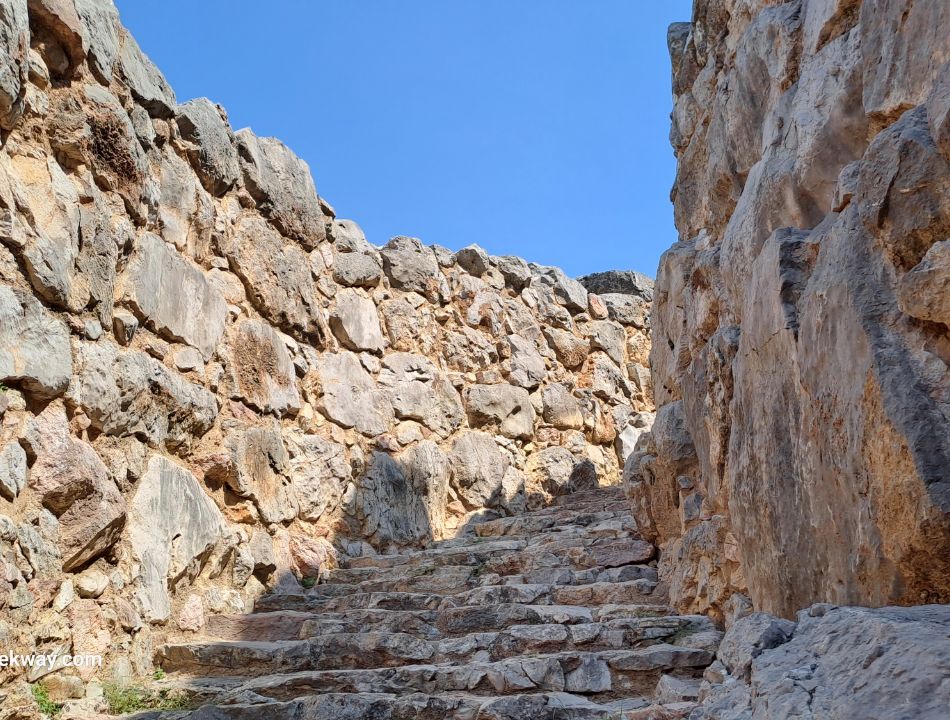 A stone stair flanked by massive walls in Tiryns Archaeological site in Greece. 
