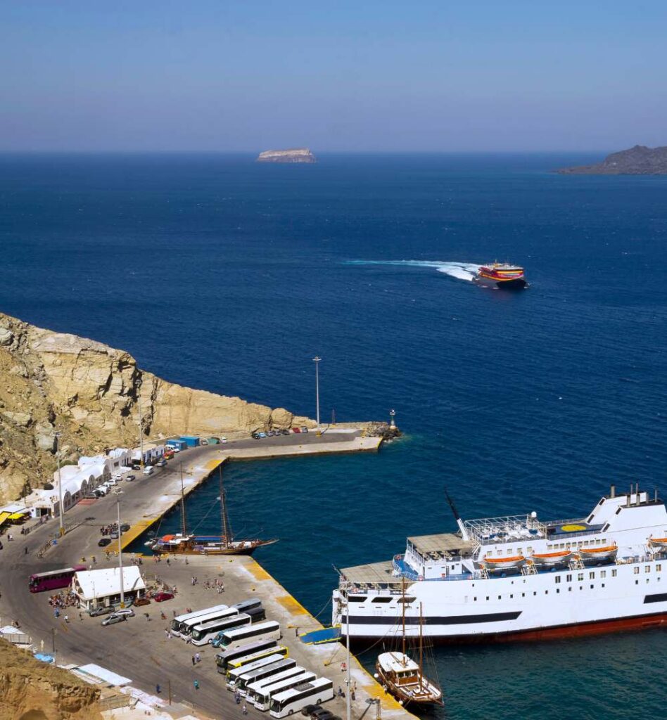 Classic Santorini caldera scenery with white houses perched on dramatic cliffs.