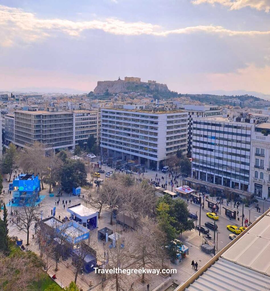 High-angle view of Syntagma Square and the Acropolis at sunset from the Hotel Grande Bretagne.