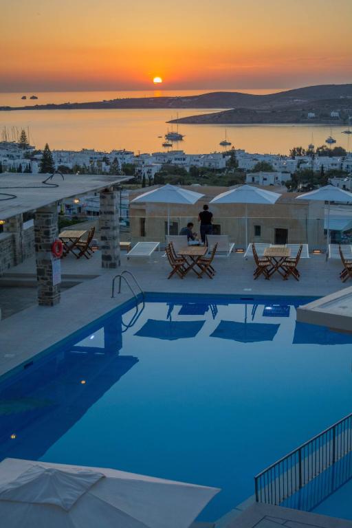 Luxurious pool area at Naxos Cave Suites, offering a serene retreat with views of the surrounding landscape.