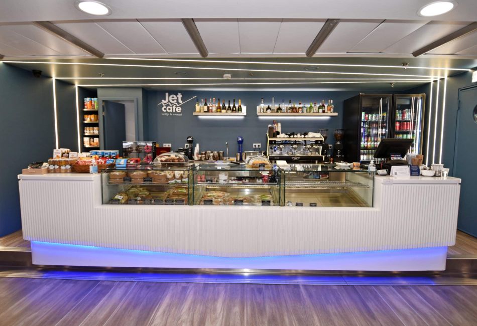 Modern café bar on a SeaJets ferry in Greece, offering snacks, beverages, and refreshments for passengers during their journey.