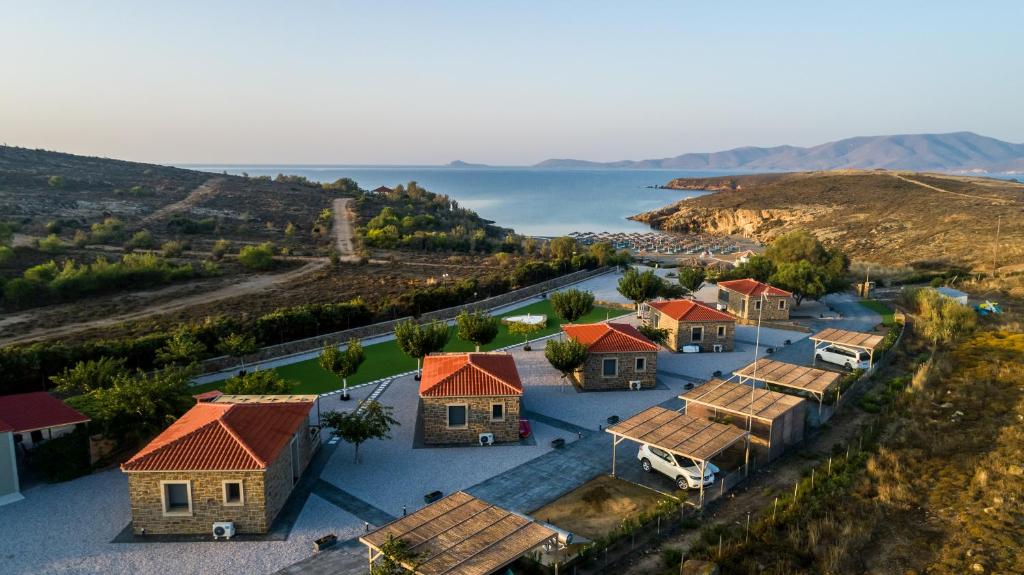 Cozy cottages surrounded by natural scenery, offering direct access to the beach.