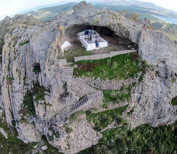  An iconic, roofless church located on a mountain cliff, overlooking Lemnos island.