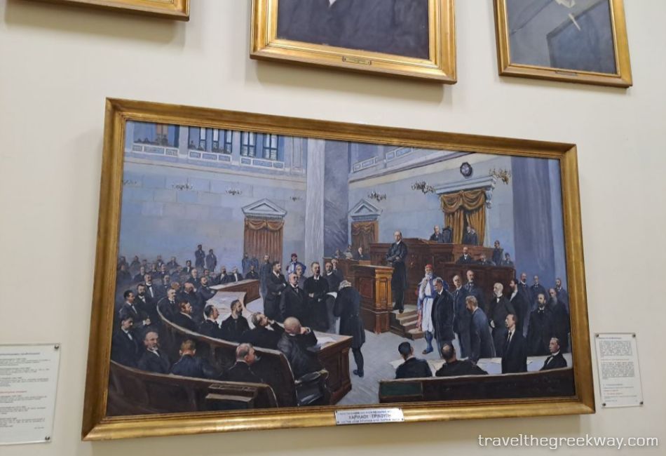 Painting depicting a historic Greek parliament session displayed at the National Historical Museum in Athens.